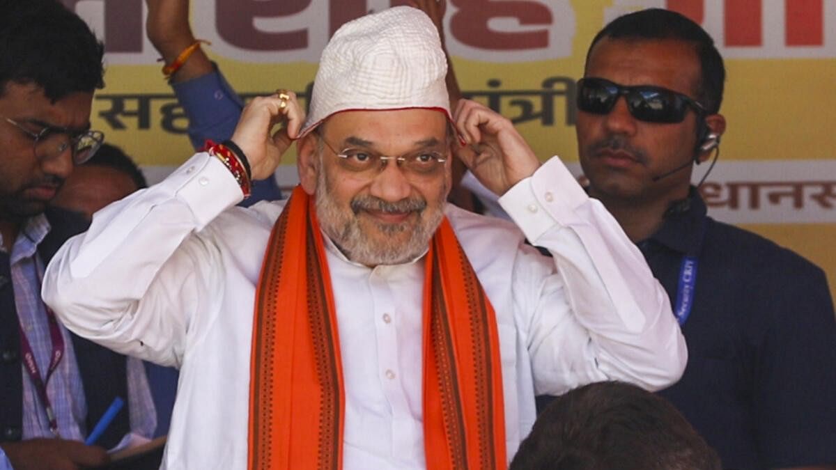 <div class="paragraphs"><p>Amit Shah gestures during a public meeting in Kishtwar.</p></div>