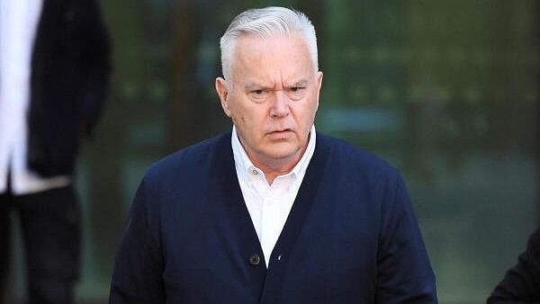 <div class="paragraphs"><p>Former BBC news presenter Huw Edwards walks after his sentencing at London's Westminster Magistrates' Court in London, Britain, September 16, 2024. </p></div>