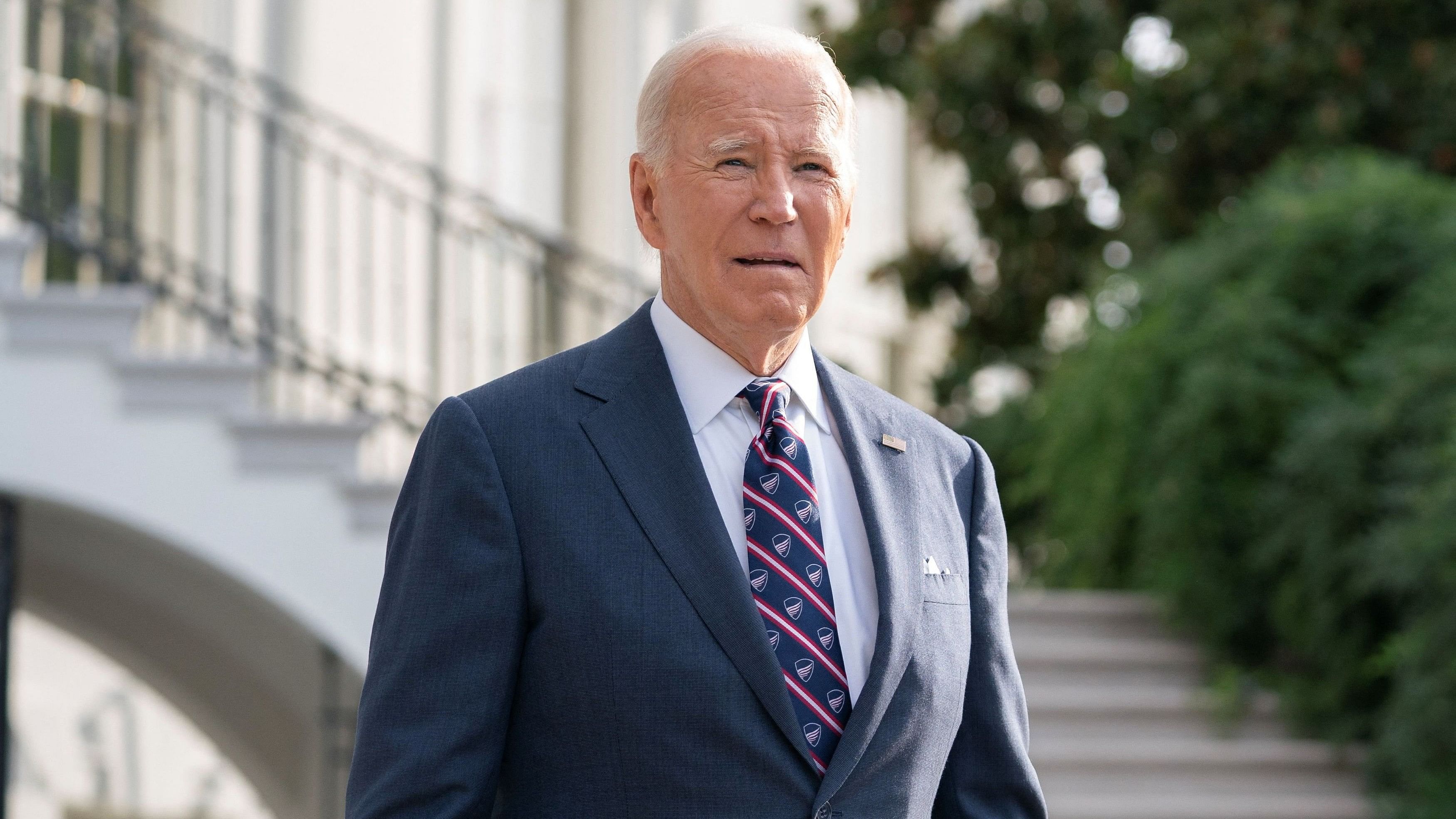 <div class="paragraphs"><p>US President Joe Biden speaks with members of the media before boarding Marine One en route to Wilmington, Delaware from the South Lawn of the White House in Washington, U., September 16, 2024.</p></div>