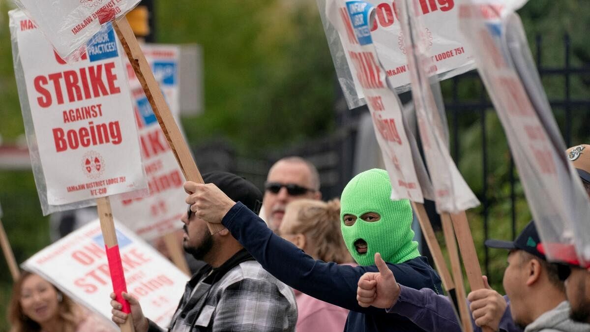 <div class="paragraphs"><p>Boeing workers gather on a picket line during the strike near the entrance to a production facility in Washington.</p></div>