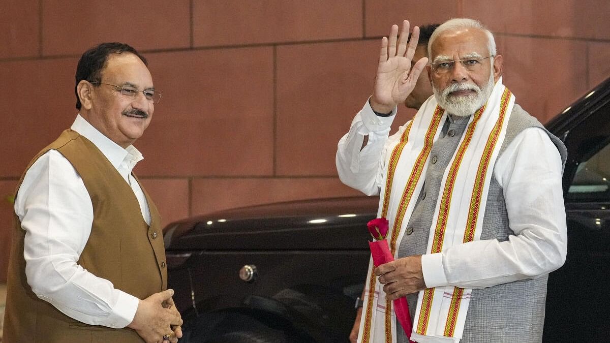 <div class="paragraphs"><p>Prime Minister Narendra Modi with Union Health Minister J P Nadda.</p></div>