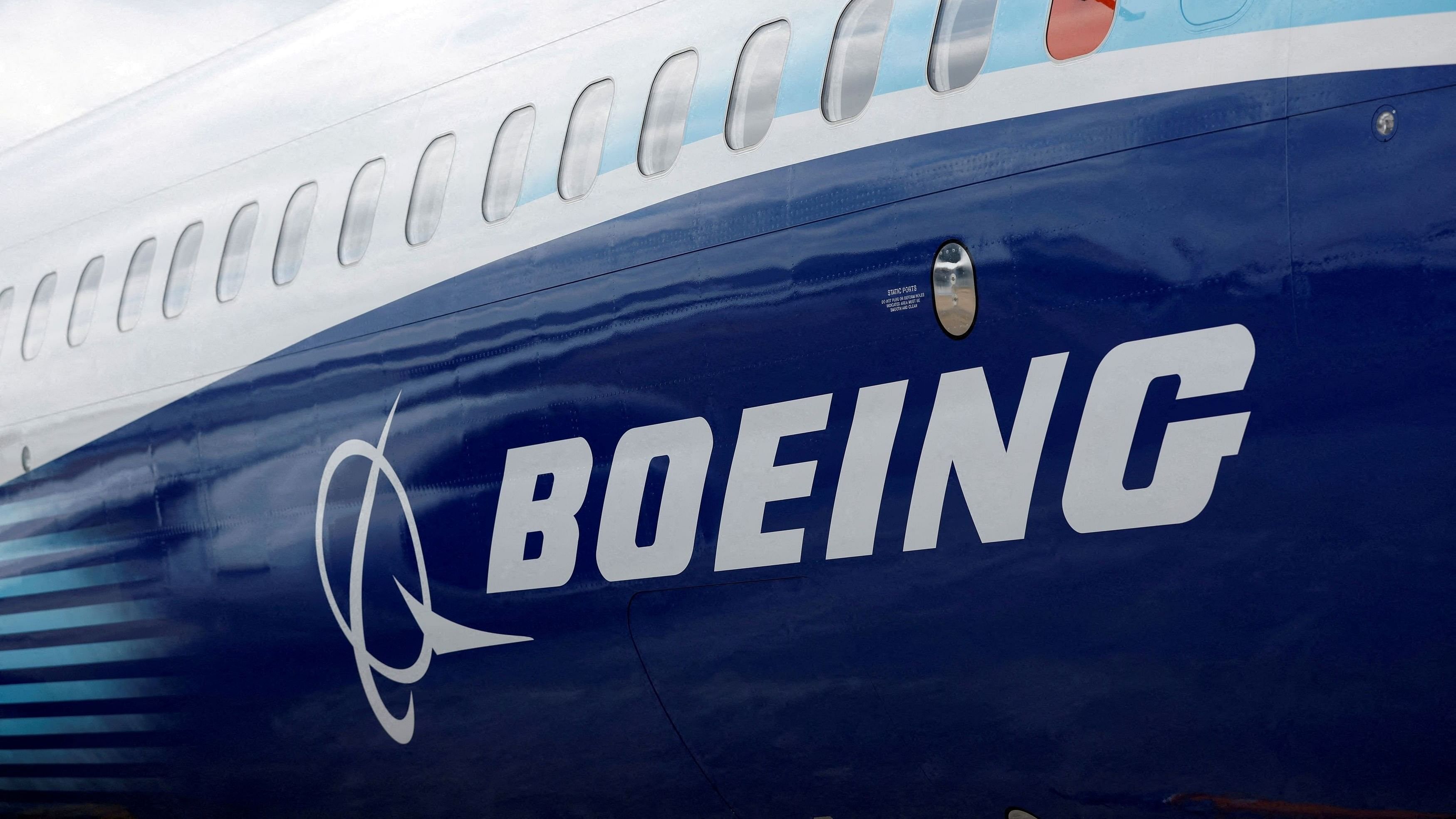 <div class="paragraphs"><p>The Boeing logo is seen on the side of a Boeing 737 MAX at the Farnborough International Airshow, in Farnborough, Britain, July 20, 2022.  </p></div>