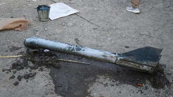 <div class="paragraphs"><p>Remains of a missile lie on the ground in Moirang in Manipur, India.</p></div>