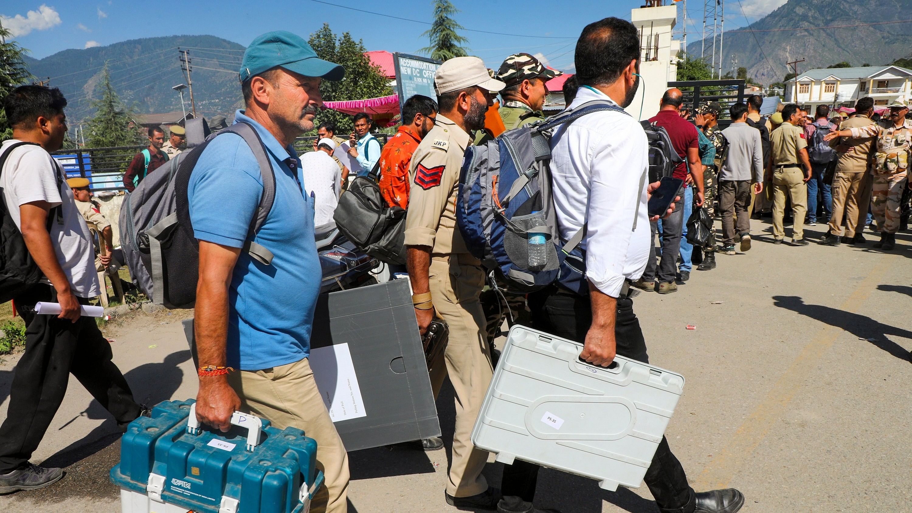 <div class="paragraphs"><p>Polling officials leave for their respective polling stations on the eve of first phase of the Jammu and Kashmir Assembly election, in Kishtwar district, Tuesday, Sept. 17, 2024. </p></div>