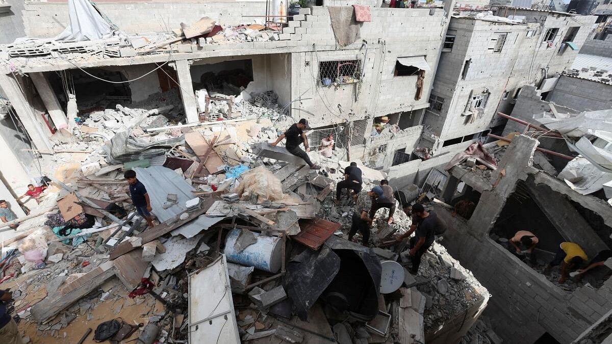 <div class="paragraphs"><p>Aftermath of an Israeli strike on a house in Nuseirat in the central Gaza Strip.</p></div>