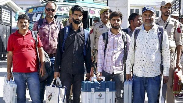 <div class="paragraphs"><p>Polling officials leave for their respective polling stations on the eve of first phase of the Jammu and Kashmir Assembly election, in Kishtwar district.&nbsp;</p></div>