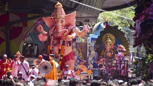 <div class="paragraphs"><p>Devotees carry idols of Lord Ganesh for immersion on the final day of Ganpati festival, in Mumbai, Tuesday, Sept. 17 2024.</p></div>