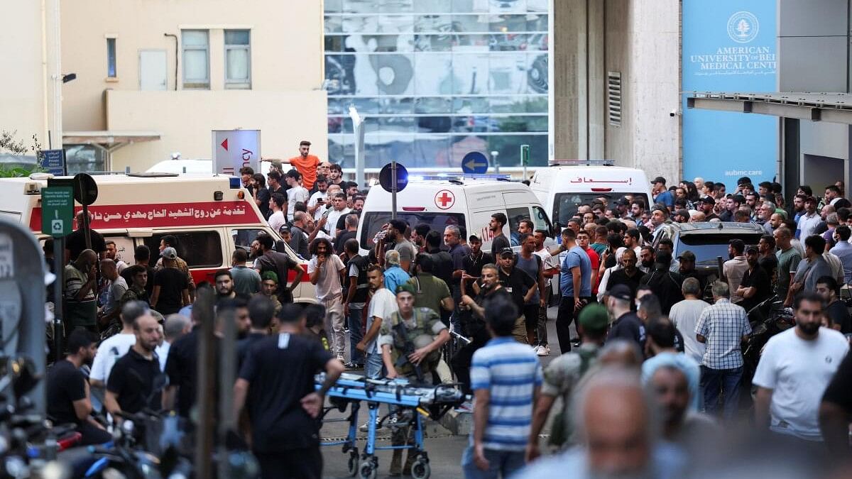 <div class="paragraphs"><p>People gather outside a hospital, as more than 1,000 people, including Hezbollah fighters and medics, were wounded on Tuesday when the pagers they use to communicate exploded across Lebanon.</p></div>