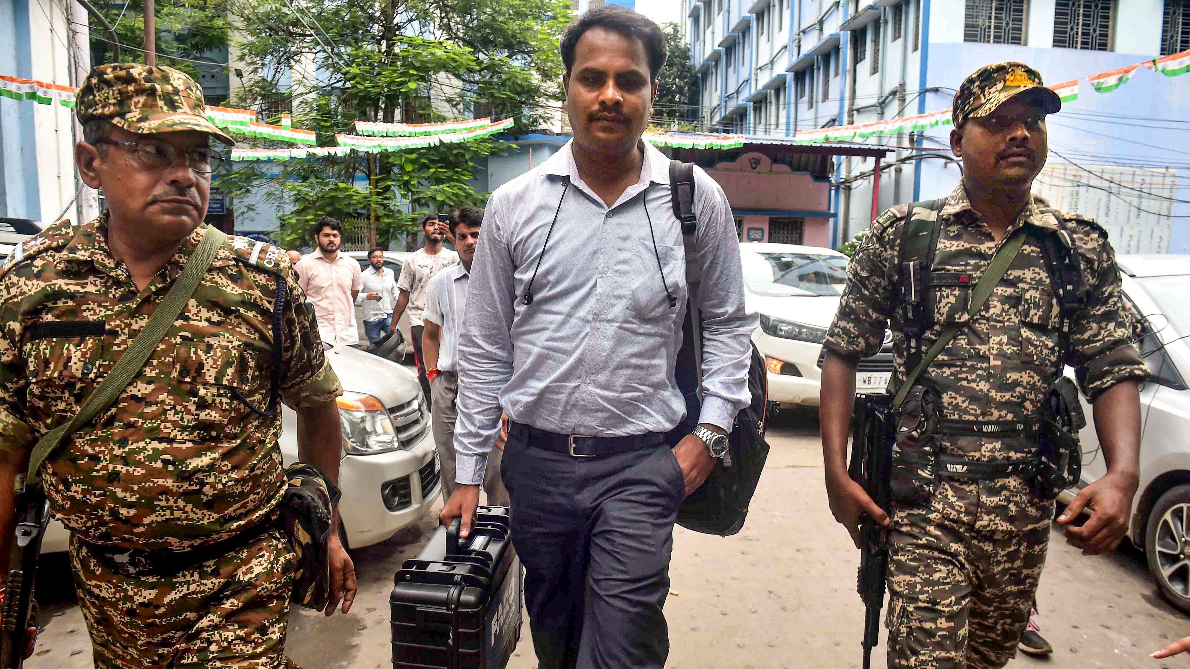 <div class="paragraphs"><p>Kolkata: A CBI official arrives during investigation of the rape and murder of a woman doctor, at R G Kar Medical College and Hospital in Kolkata, Friday, Aug. 16, 2024. </p></div>