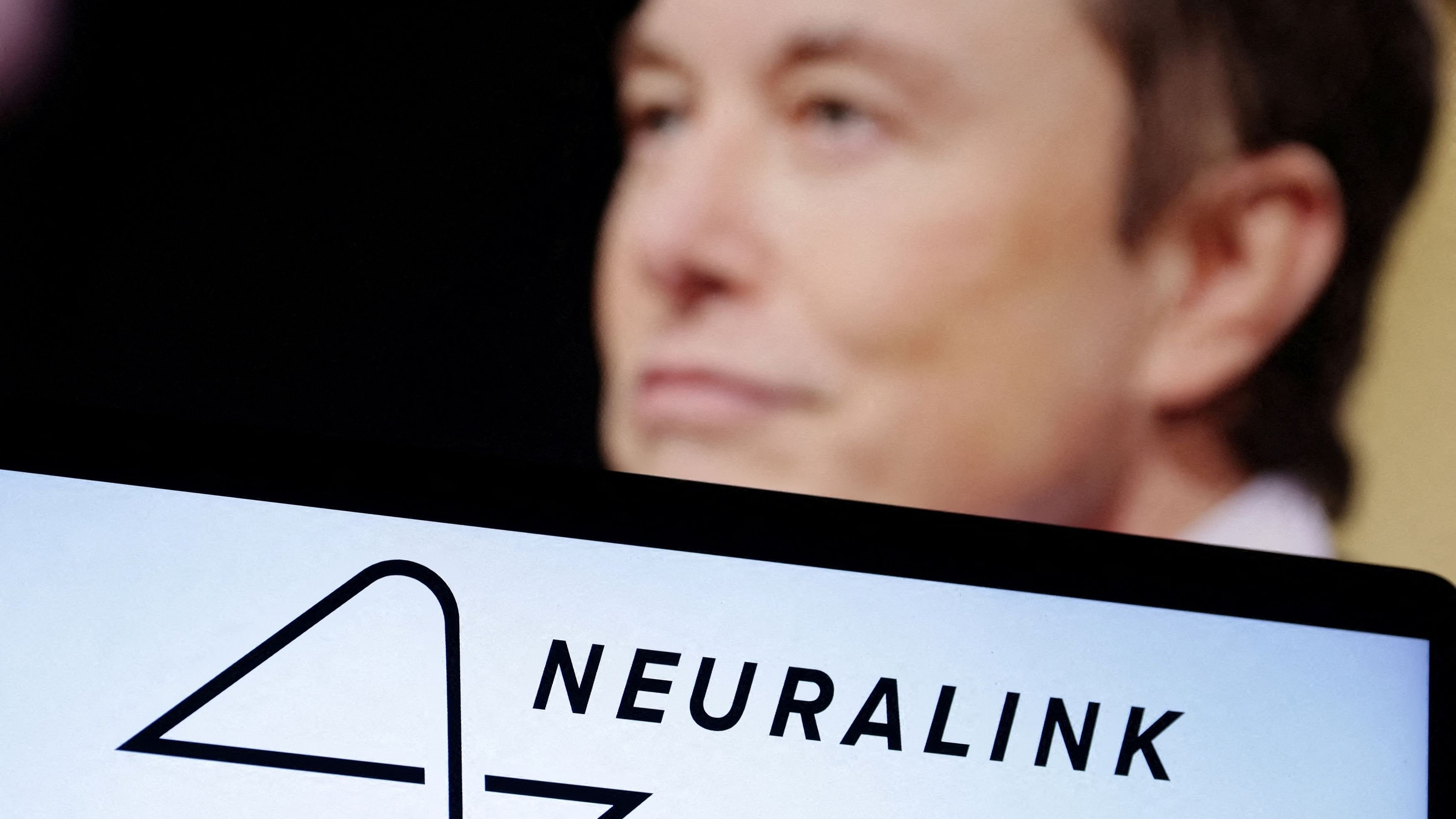 <div class="paragraphs"><p>Neuralink logo and Elon Musk photo are seen in this illustration.</p></div>