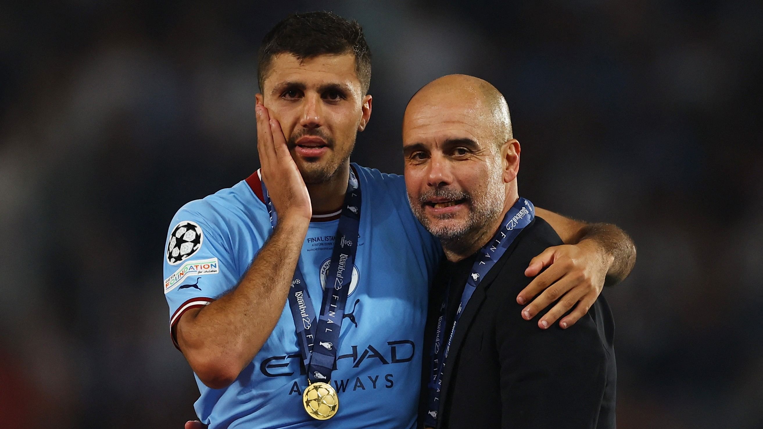 <div class="paragraphs"><p>Manchester City's Rodri and manager Pep Guardiola</p></div>