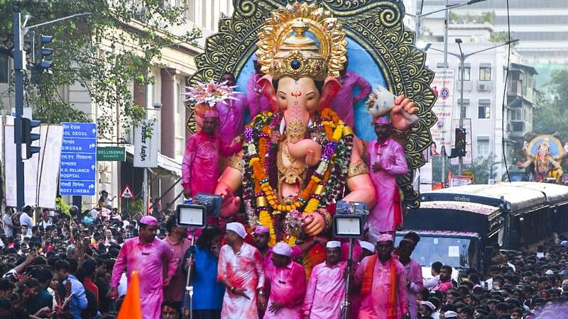 <div class="paragraphs"><p>Devotees attend the visarjan (immersion) procession of the grand idol of Lalbaugcha Raja, one of Mumbai’s most revered Ganesh idols.&nbsp;</p></div>