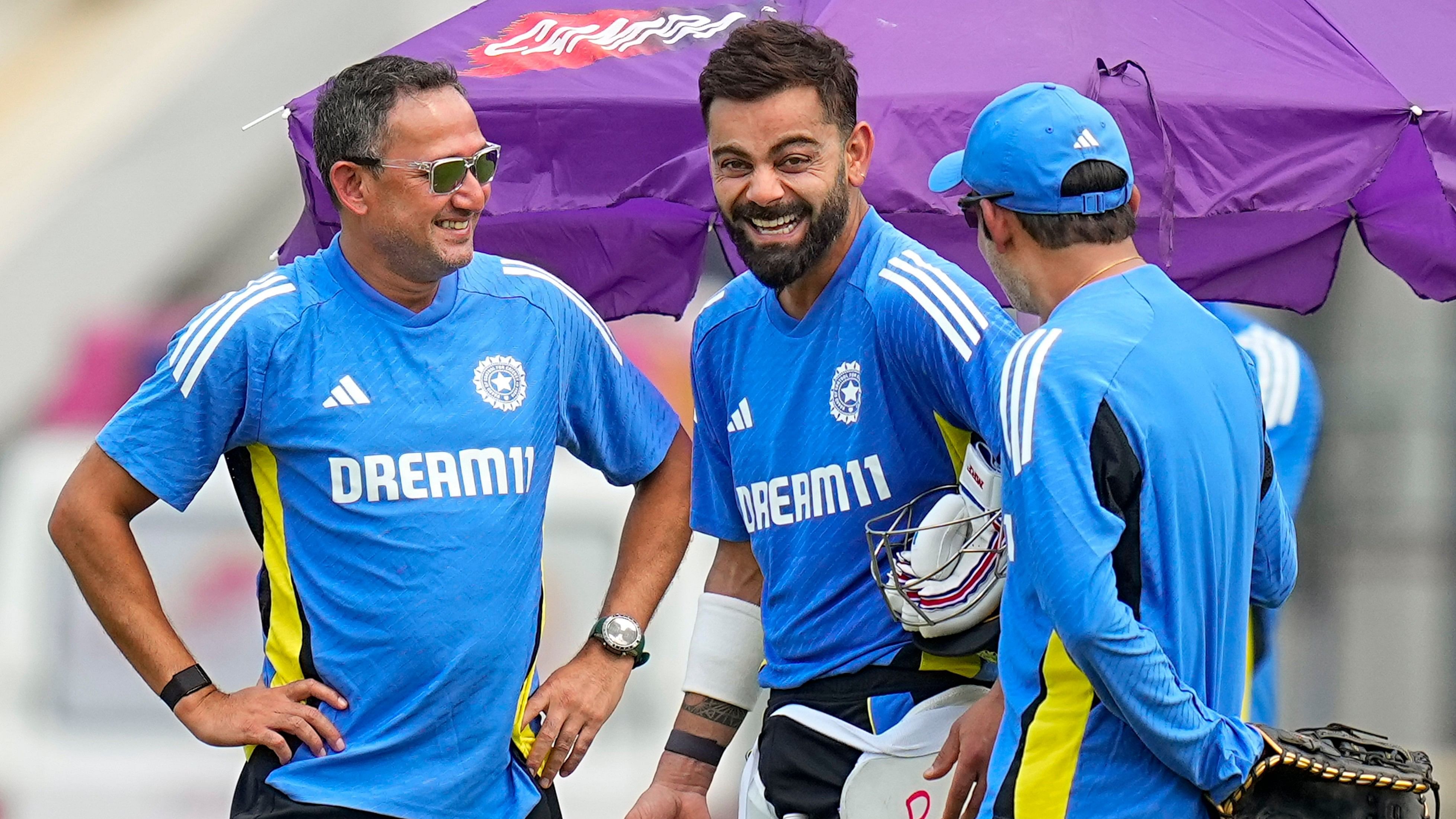 <div class="paragraphs"><p>Chief selector Ajit Agarkar (left), star batter Virat Kohli (centre) and head coach Gautam Gambhir share a light moment during a practice session, ahead of the first Test against Bangladesh in Chennai. </p></div>