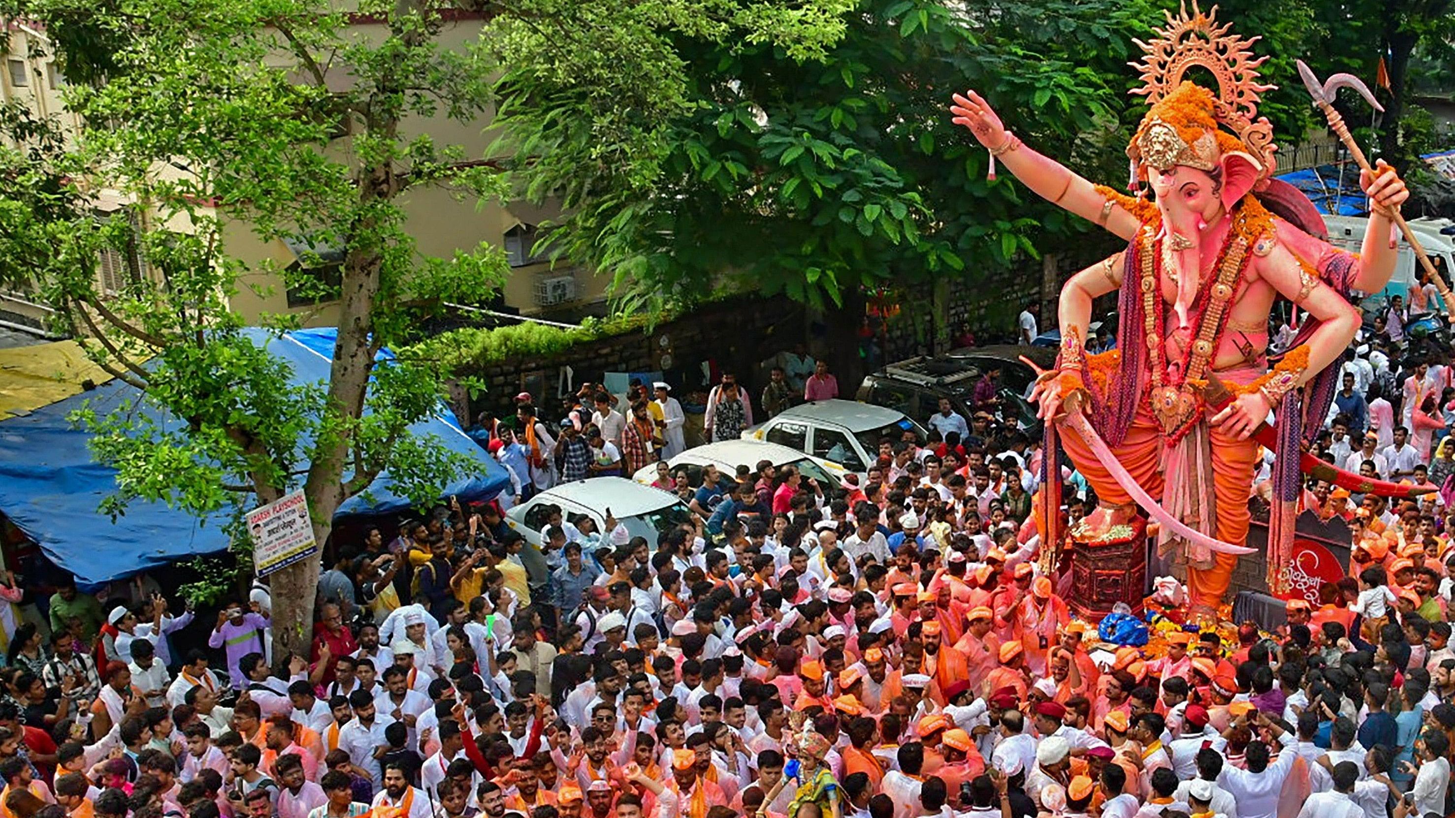 <div class="paragraphs"><p>Devotees take part in a procession for immersion (visarjan) of the Lord Ganesha. (Representative image)</p></div>