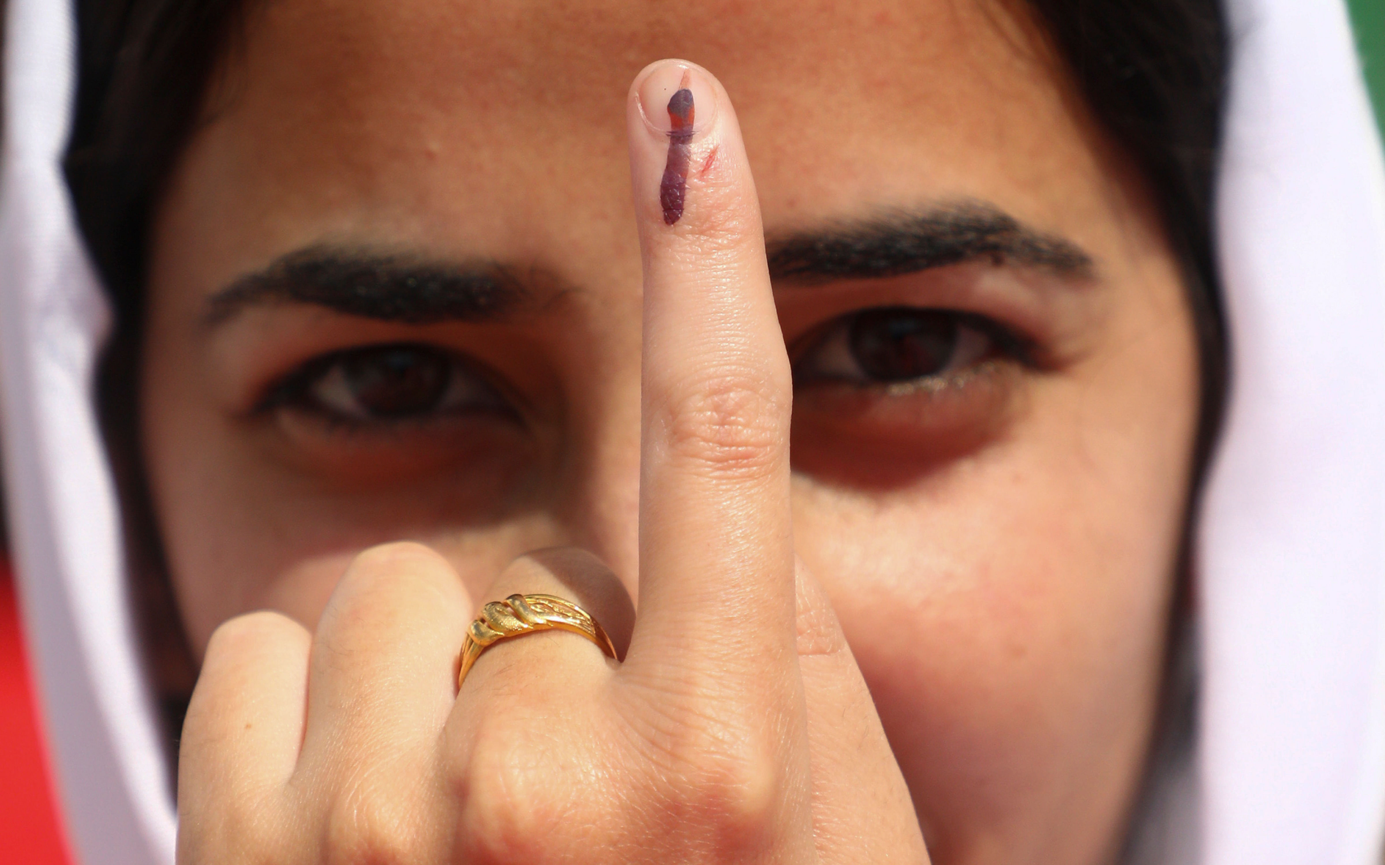 <div class="paragraphs"><p>A voter show her finger marked with indelible ink after casting her vote during the first phase of Jammu and Kashmir Assembly elections, in Kishtwar district of J&amp;K, Wednesday, Sept. 18, 2024.</p></div>