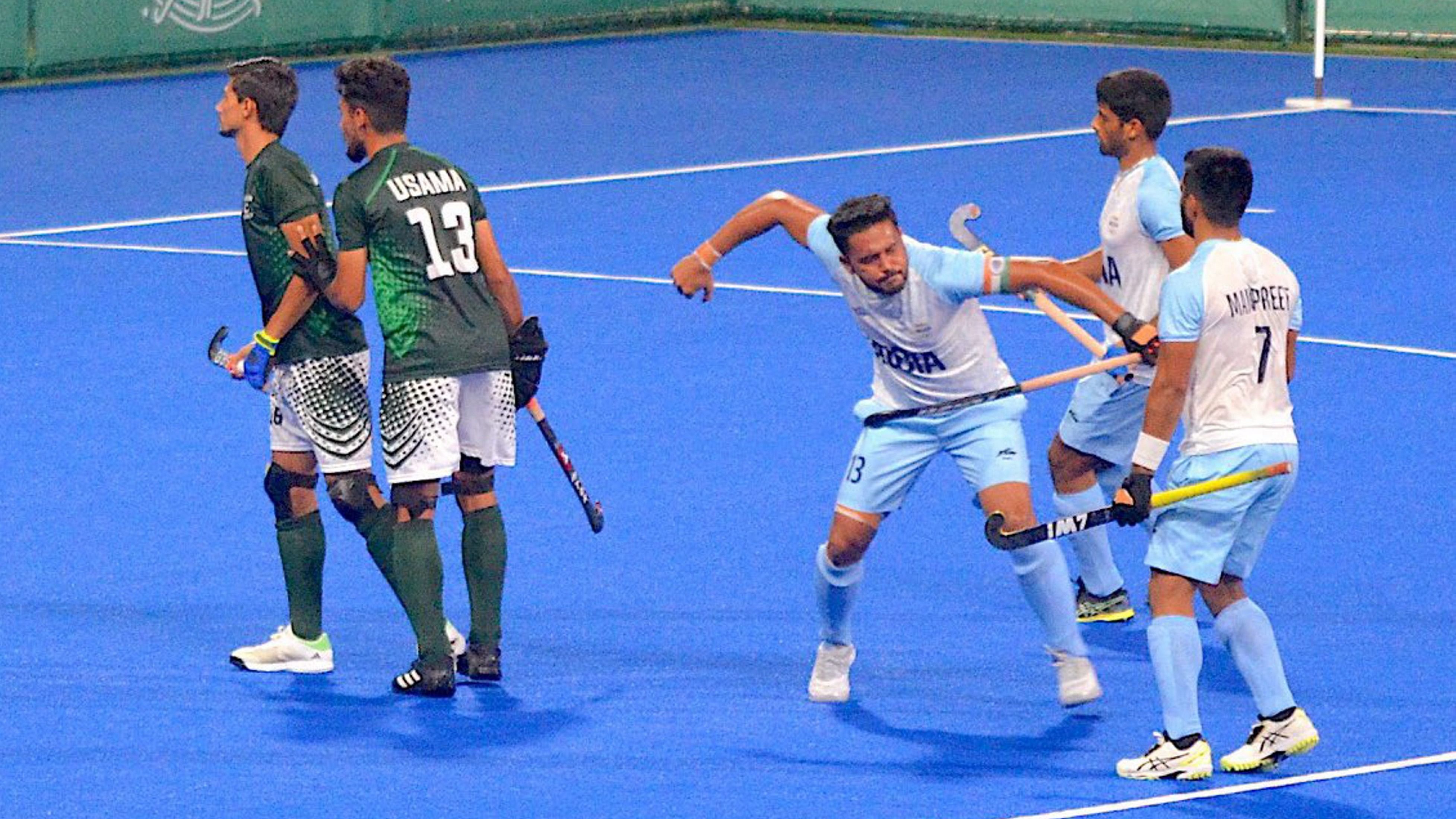 <div class="paragraphs"><p>Indian captain Harmanpreet Singh with teammates during the hockey match against Pakistan at the 19th Asian Games, in Hangzhou, China, Saturday.</p></div>