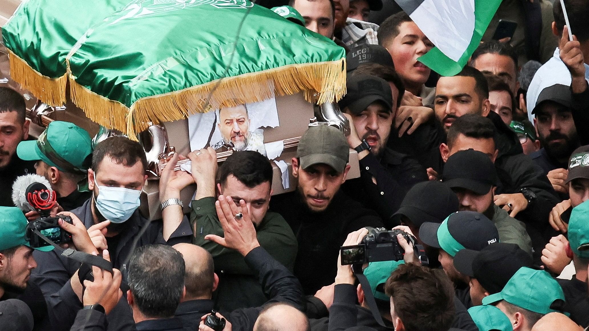 <div class="paragraphs"><p>Mourners gather during the funeral of deputy head of Hamas, Saleh al-Arouri, who was killed by what Lebanese and Palestinian security sources say was a drone strike by Israel in Beirut, Lebanon January 4, 2024.</p></div>