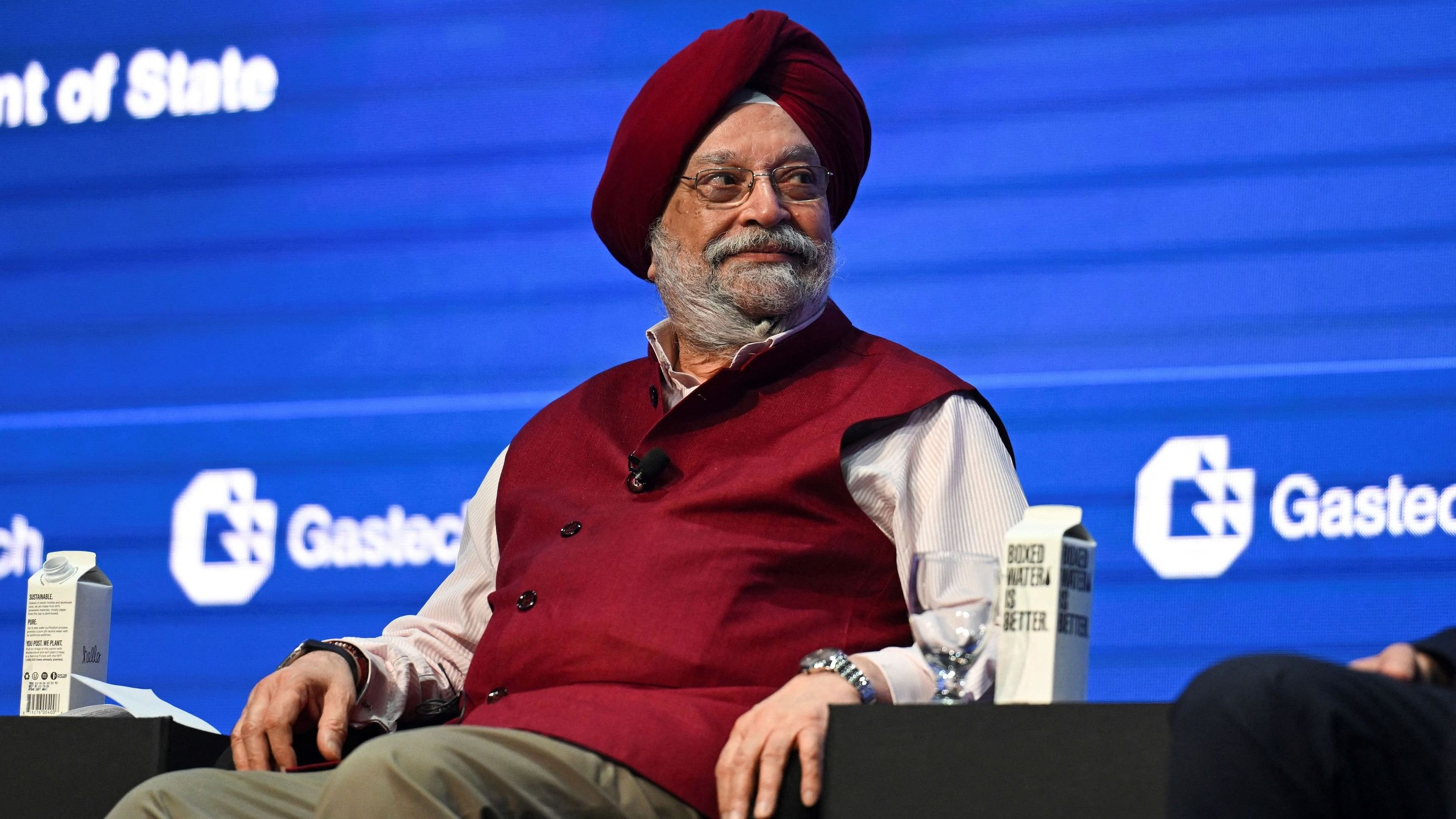 <div class="paragraphs"><p>India's Minister of Petroleum &amp; Natural Gas Hardeep Singh Puri sits on a panel as top energy executives and ministers meet in Houston for the annual Gastech conference in Houston, Texas, US.</p></div>