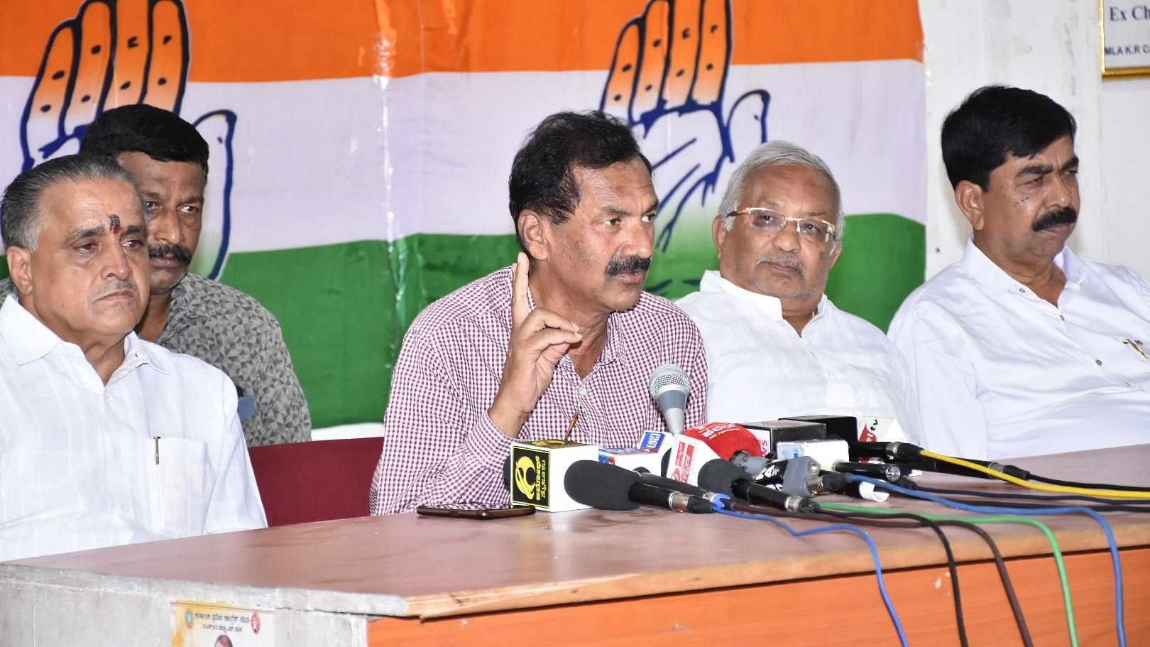 <div class="paragraphs"><p>KPCC spokesman M Lakshamana  during a press conference</p></div>