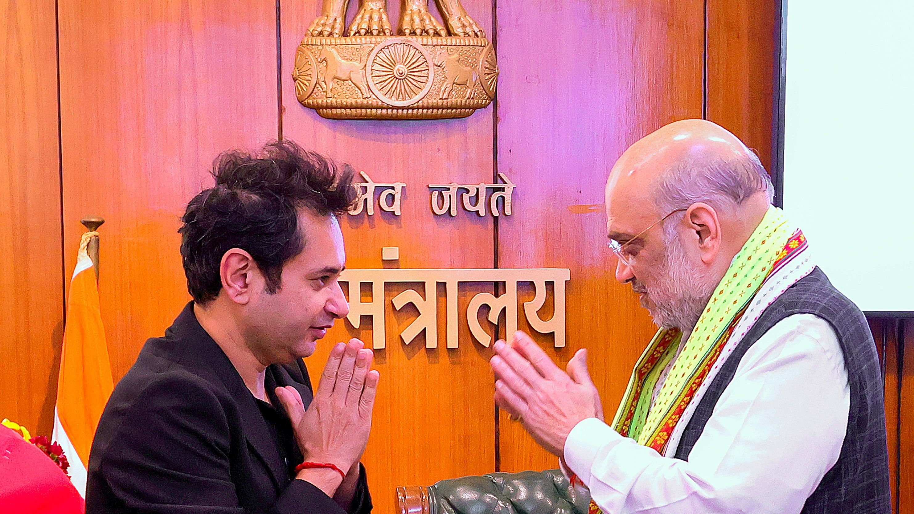 <div class="paragraphs"><p>Union Home Minister Amit Shah being greeted by Tipra Motha supremo Pradyot Deb Barma during the signing of agreement between Tipra Motha and the governments of Tripura and India, in New Delhi, Saturday, March 2, 2024.</p></div>