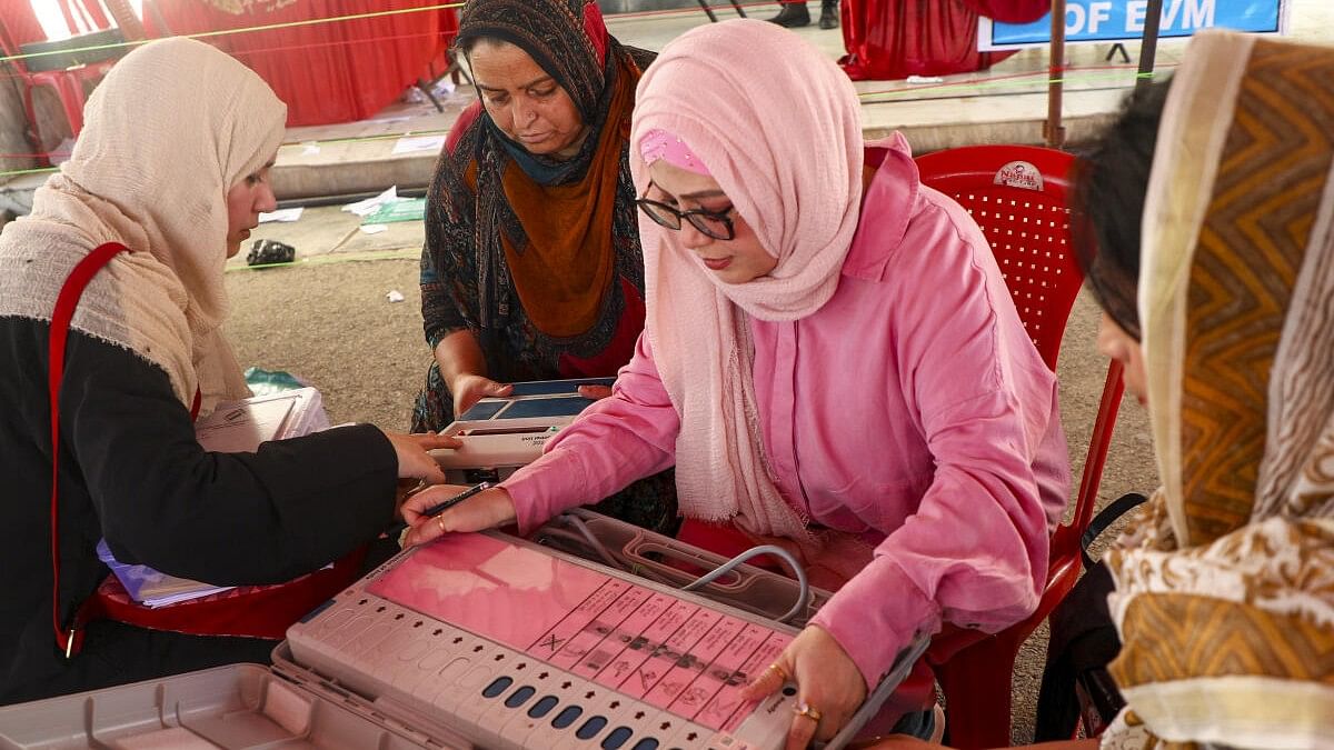 <div class="paragraphs"><p>Polling officials check EVMs and other election material.</p></div>