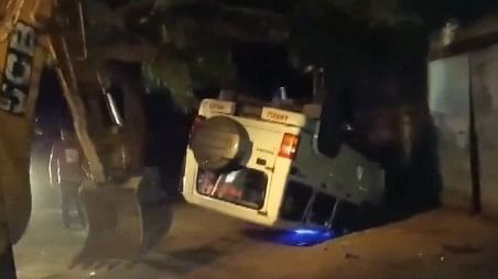 <div class="paragraphs"><p>Screengrab of video showing the overturned police vehicle.</p></div>