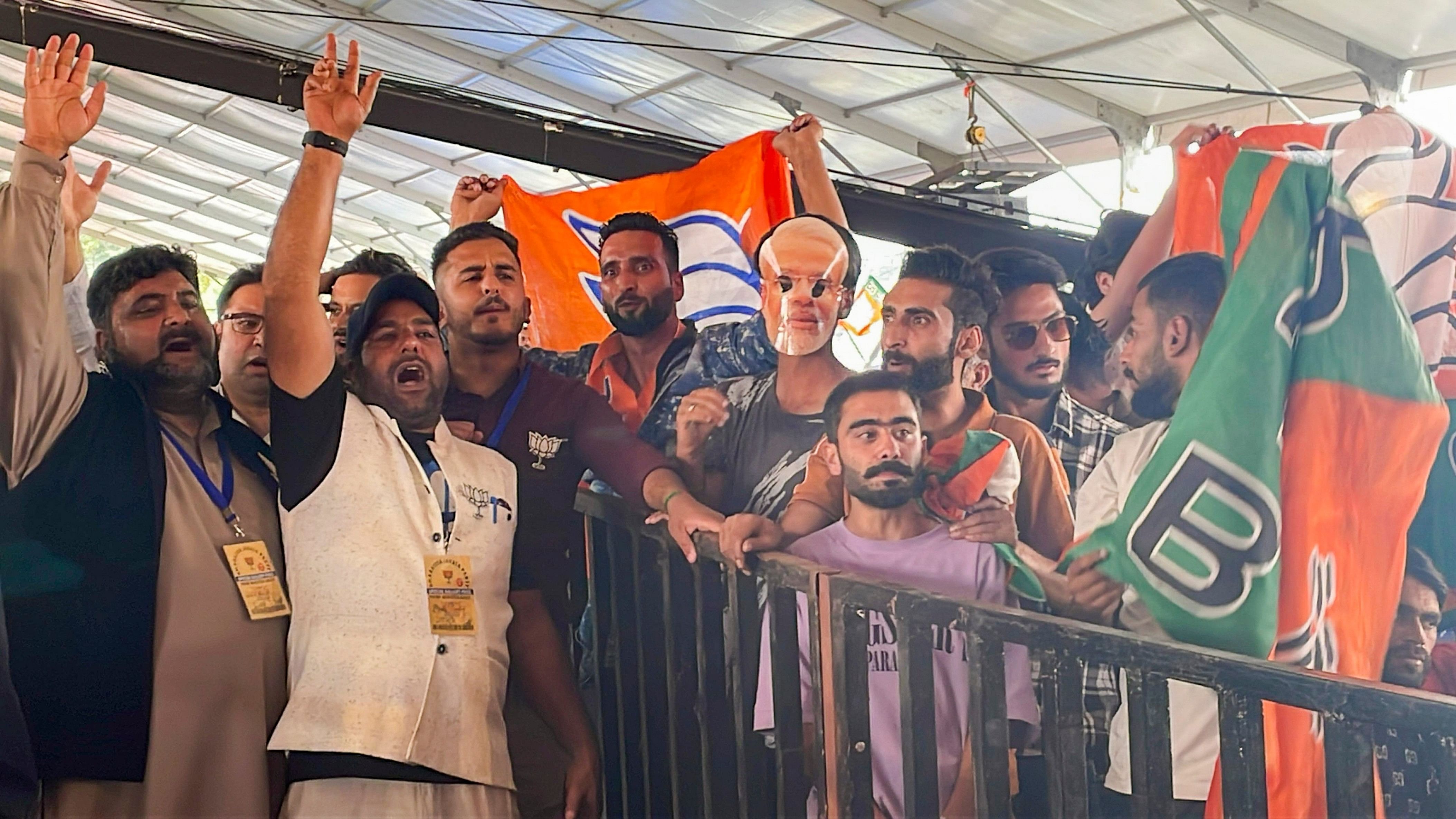 <div class="paragraphs"><p>BJP supporters at the venue of Prime Minister Narendra Modi's public meeting for Jammu &amp; Kashmir elections, in Srinagar.</p></div>