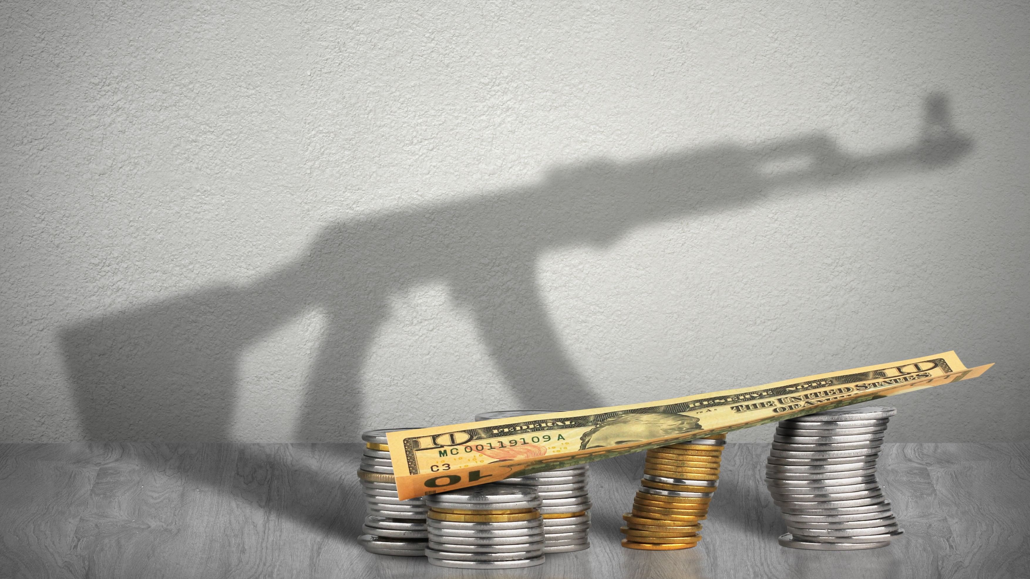 <div class="paragraphs"><p>Image showing a dollar bill, coins, and the silhouette of an AK-47 rifle. For representational purposes.</p></div>