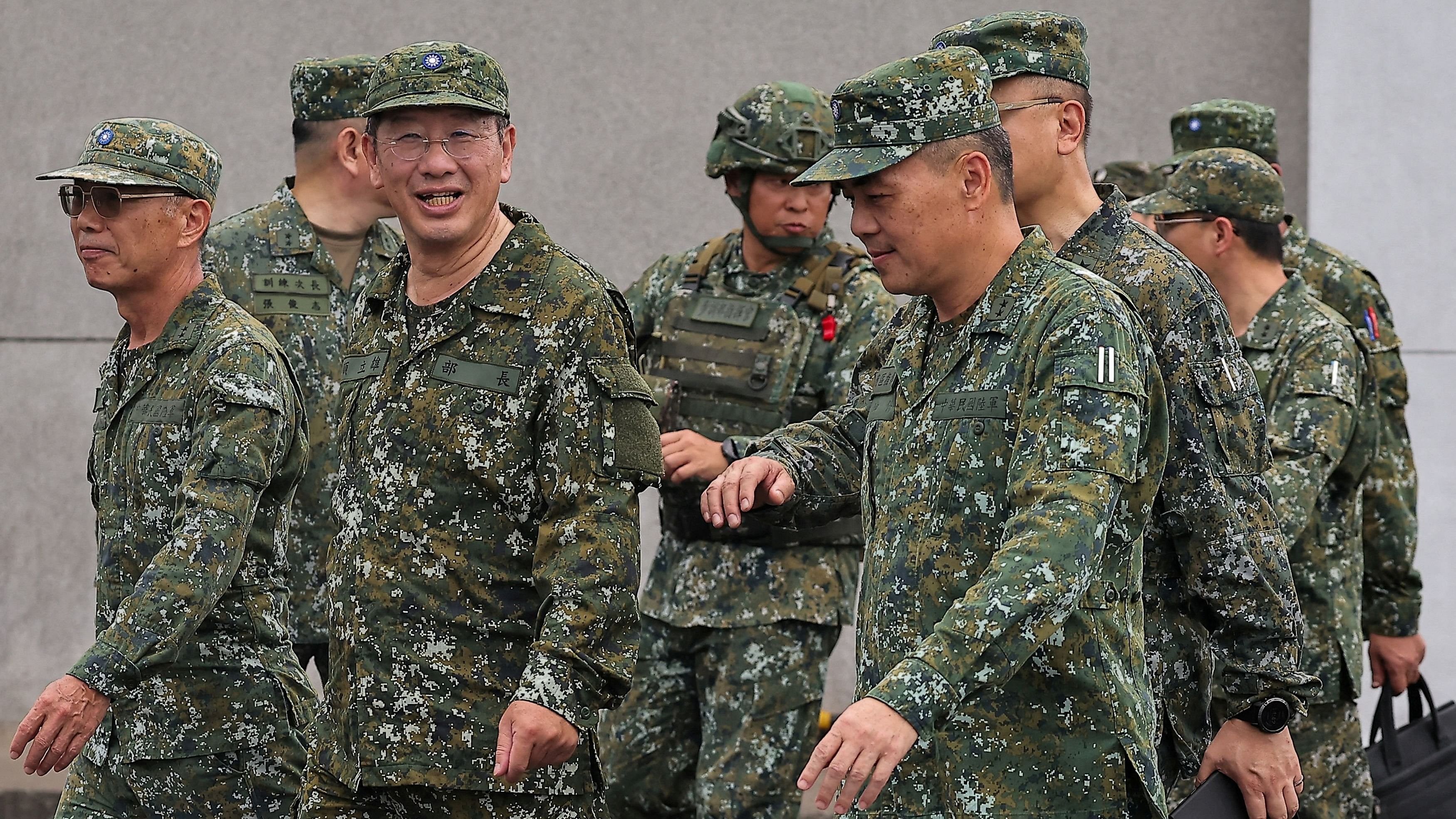 <div class="paragraphs"><p>Defence Minister Wellington Koo inspects troops during a live fire exercise at the Fangshan training grounds in Pingtung, Taiwan.</p></div>