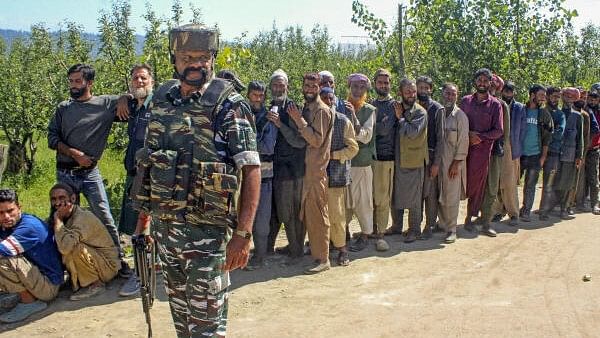 <div class="paragraphs"><p>People line up to cast their votes in J&amp;K</p></div>