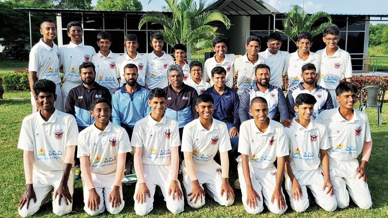 Poorna Vikasa Vidyalaya, winners of the KM Ramprasad Shield for U-16 inter-school second division tournament. STANDING (from left): Suvik Gill, Praneel G, Malikarjun S, Pramod D, Atharv S Deshpande, Chirayu S, Pratham B, Mandar Pai, Ayush Kumar, Siddharth R, Likhit G, Nikhil S Gowda. SITTING: Gautam S, Syed Z (Coach), Kumar TV (Manager), Vineet M (CEO), Vishwanath HK, Mithun M; KNEELING: Adhityan S, Hrishi M, Mikil Shreyal, Dhyaan Mahesh Hiremath, Aryaansh Pareek, Adi Raj, Shaurya NS.