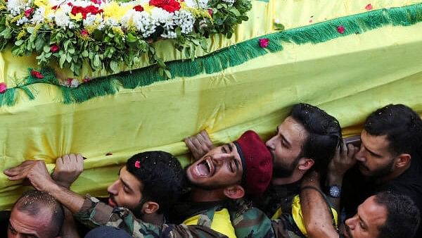 <div class="paragraphs"><p>Funeral of people who were killed following pager detonations across Lebanon on Tuesday, in Beirut suburbs</p></div>