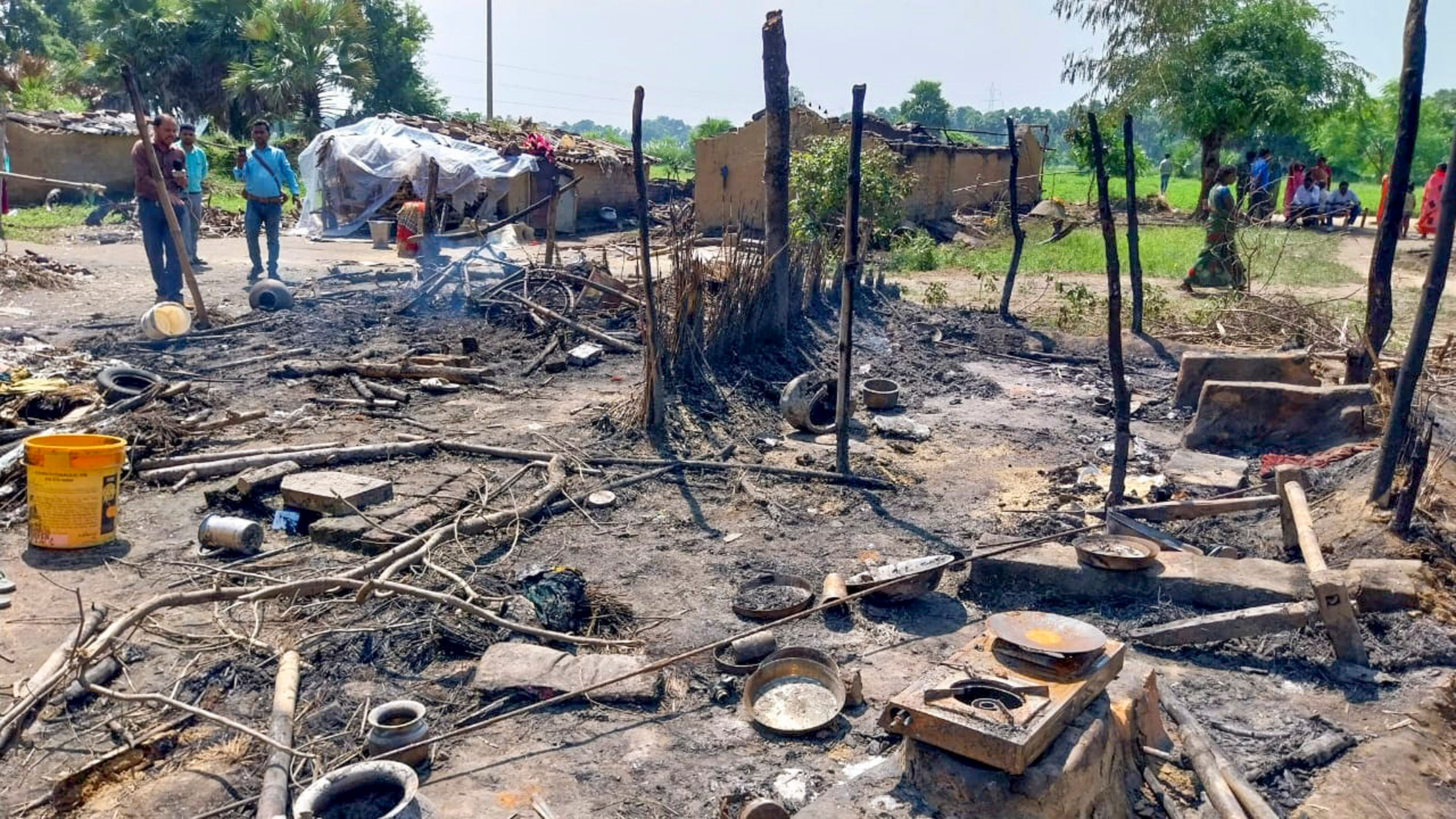 <div class="paragraphs"><p>Nawada: Charred remains are seen after multiple houses were allegedly set on fire, in Nawada district, Bihar, Thursday, Sept. 19, 2024.</p></div>