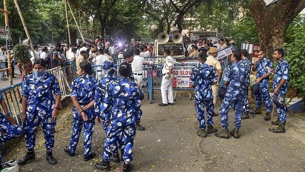 <div class="paragraphs"><p>Security personnel stand guard in front of West Bengal Medical Council office during doctors' protest over R G Kar Hospital incident, in Kolkata.</p></div>