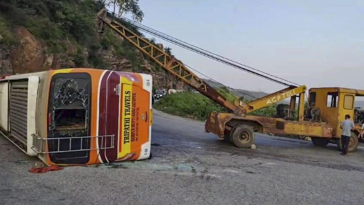 <div class="paragraphs"><p> A crane being used to tow a damaged bus, which was carrying pilgrims, after it overturned near Markundi valley, in Sonbhadra district, Uttar Pradesh.</p></div>