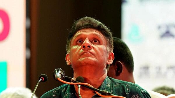 <div class="paragraphs"><p>Sajith Premadasa, leader of the Samagi Jana Balawegaya (SJB) party, looks upwards as he addresses his supporters during an election campaign rally ahead of the presidential election, in Colombo.&nbsp;</p></div>