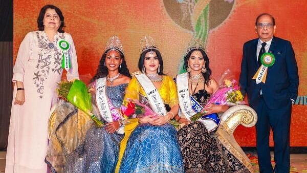 <div class="paragraphs"><p>Miss India Worldwide 2024 winner Dhruvi Patel (C) from USA, Mrs. India Worldwide 2024 winner SuAnn Mouttet (2R) from Trinidad, Miss Teen India Worldwide winner Sierra Suret from Guadeloupe (2L) with others during the beauty pageant.</p></div>