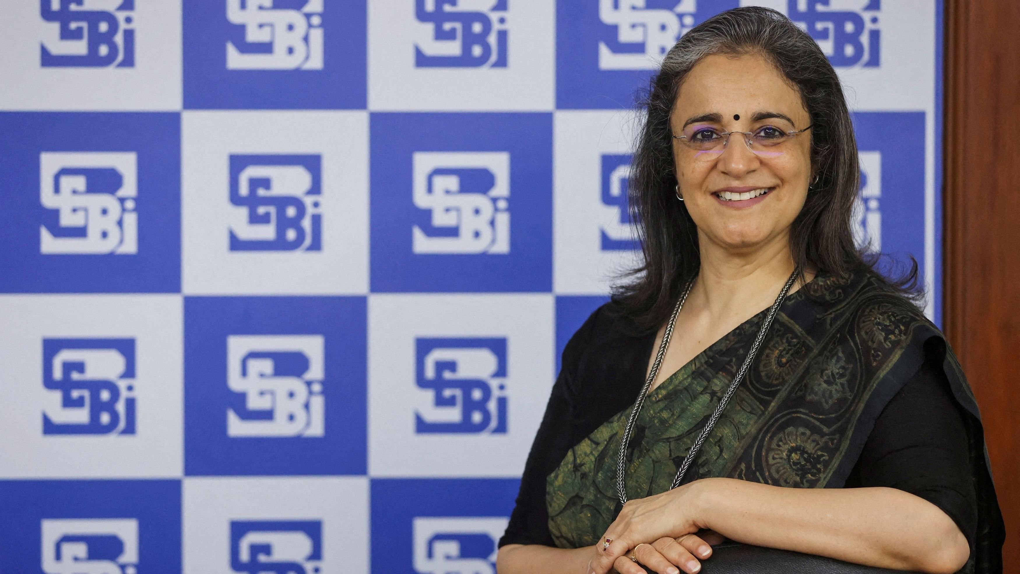 <div class="paragraphs"><p>Madhabi Puri Buch, Chairperson of Securities and Exchange Board of India, poses for a picture at the SEBI headquarters in Mumbai</p></div>