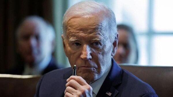 <div class="paragraphs"><p>US President Joe Biden looks on during a Cabinet meeting inside the West Wing at the White House in Washington</p></div>