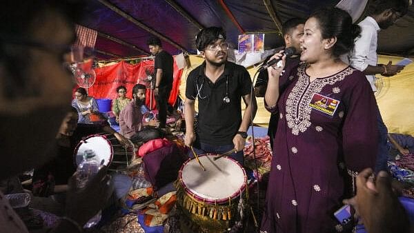 <div class="paragraphs"><p>Junior doctors continue to protest against the RG Kar Hospital rape and murder incident, at their 'dharna' site near Swasthya bhawan in Kolkata.&nbsp;</p></div>