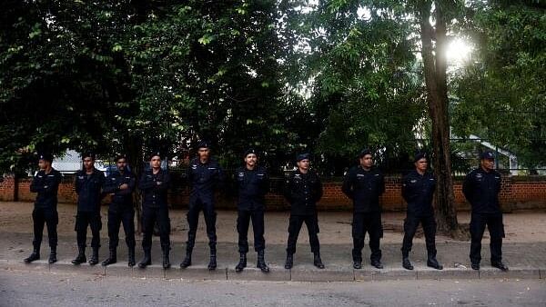 <div class="paragraphs"><p>Police officers stand guard, on the day of Sri Lanka's presidential election in Colombo, Sri Lanka September 21,2024.</p></div>