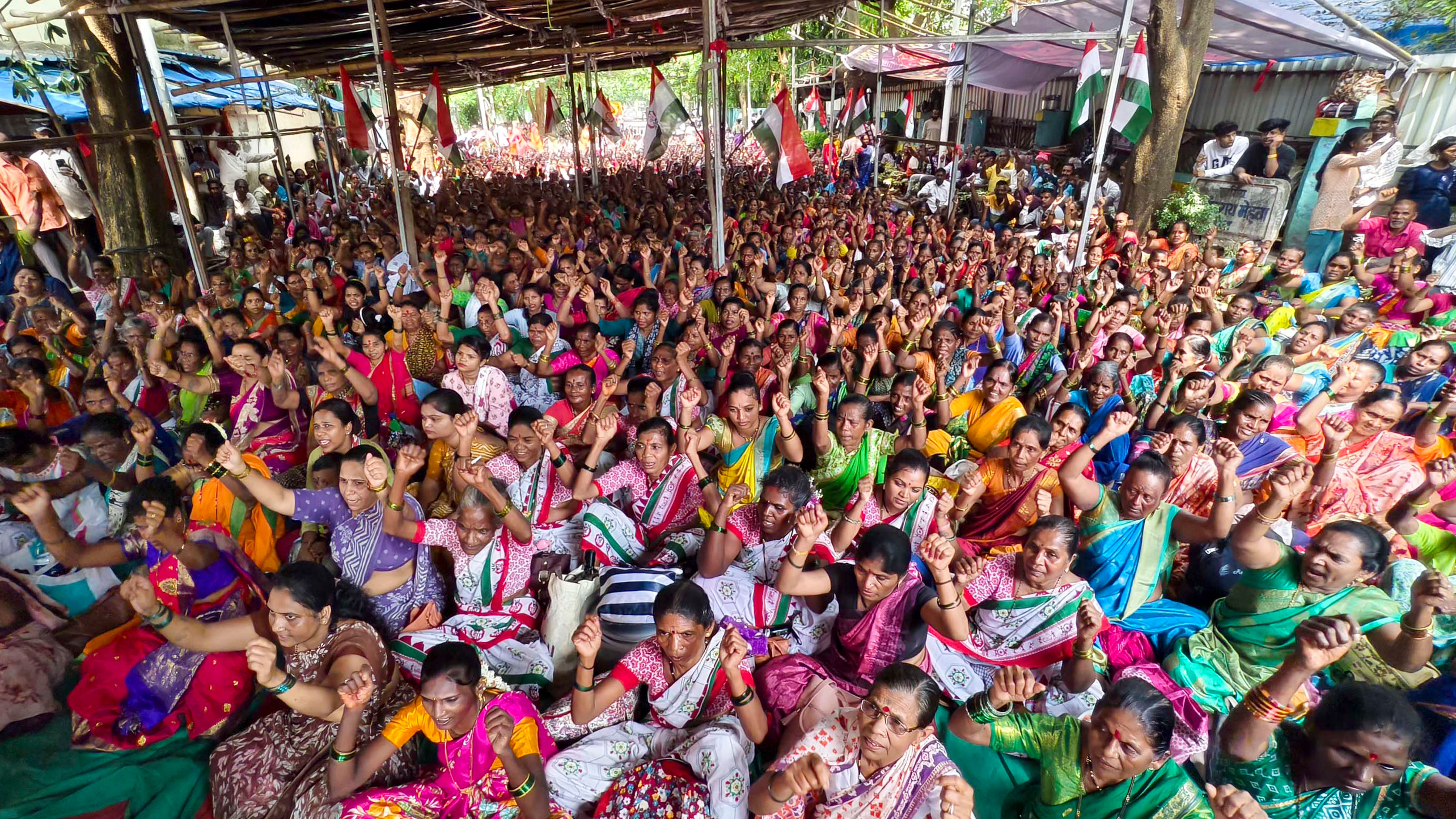 <div class="paragraphs"><p>Tribals protest at Thane Collector office, demanding transfer of forest lands to them, in Thane, Friday.</p></div>