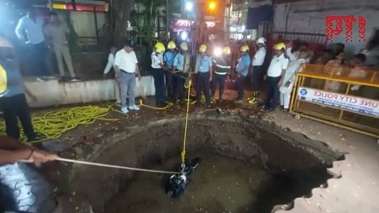 <div class="paragraphs"><p>Officials recovered a bike that fell, along with a truck, into a sinkhole that opened in Pune's Budhwar Peth area.&nbsp;</p></div>