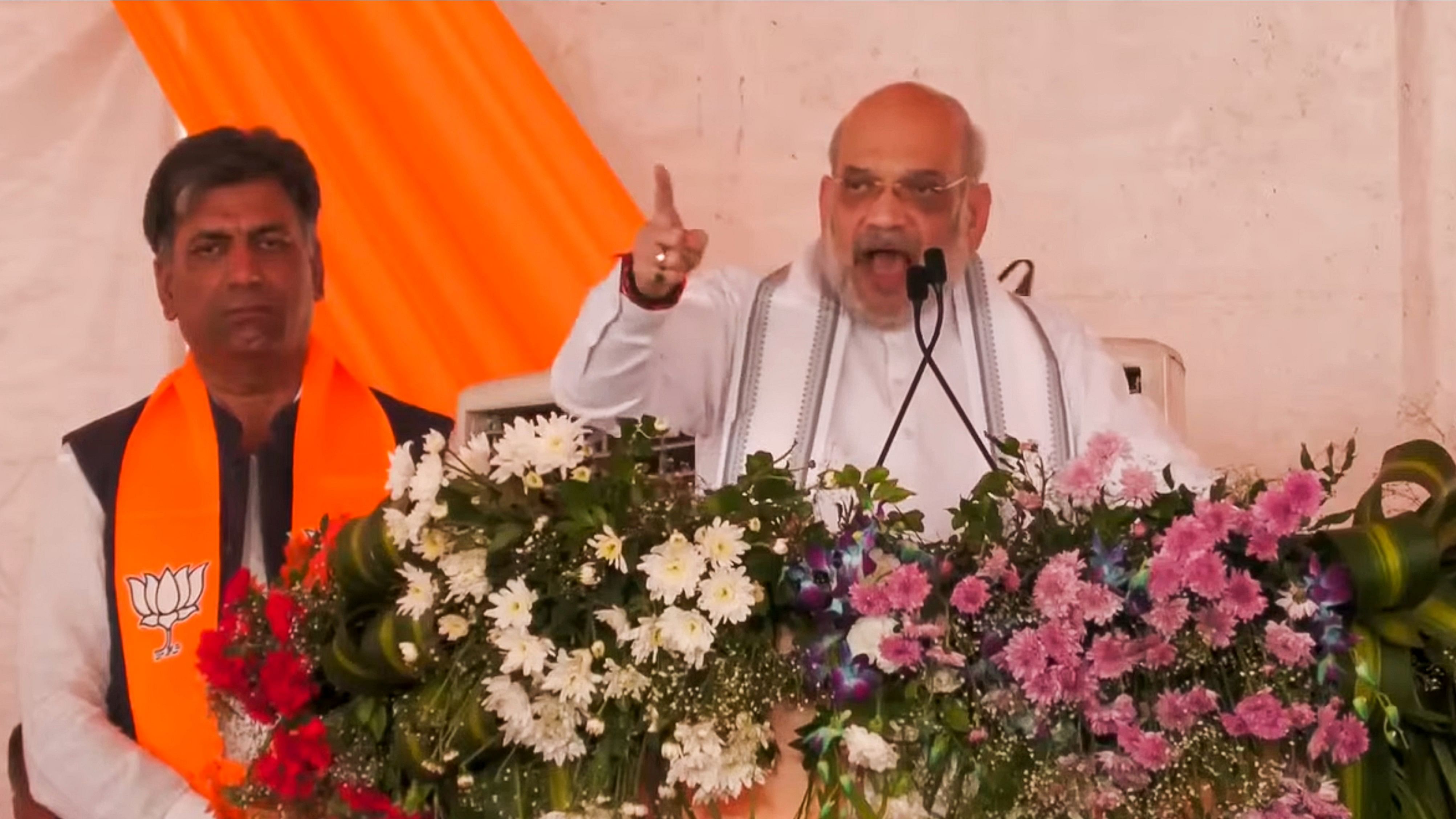 <div class="paragraphs"><p>Union Minister Amit Shah addresses during a public meeting ahead of Jammu and Kashmir Assembly election, in Mendhar, September 21, 2024.</p></div>