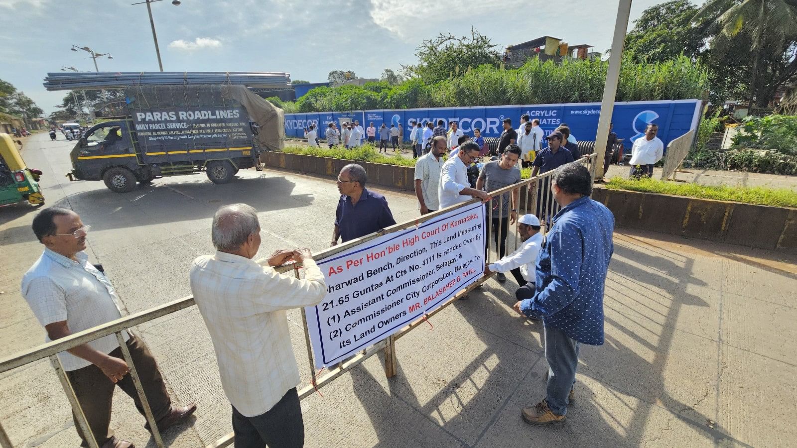 <div class="paragraphs"><p>Land on which road had been laid has been closed and handed to its owner Balasaheb Patil and banner displayed that as per the directions of the Karnataka High Court, Dharwad bench lands 21.65 gunthas in CTS No 4111 were handed over to its owner Balsaheb Patil by Assistant Commissioner, Belagavi Subdivision and BCC Commissioner near old PB Road in Belagavi on Saturday. </p></div>