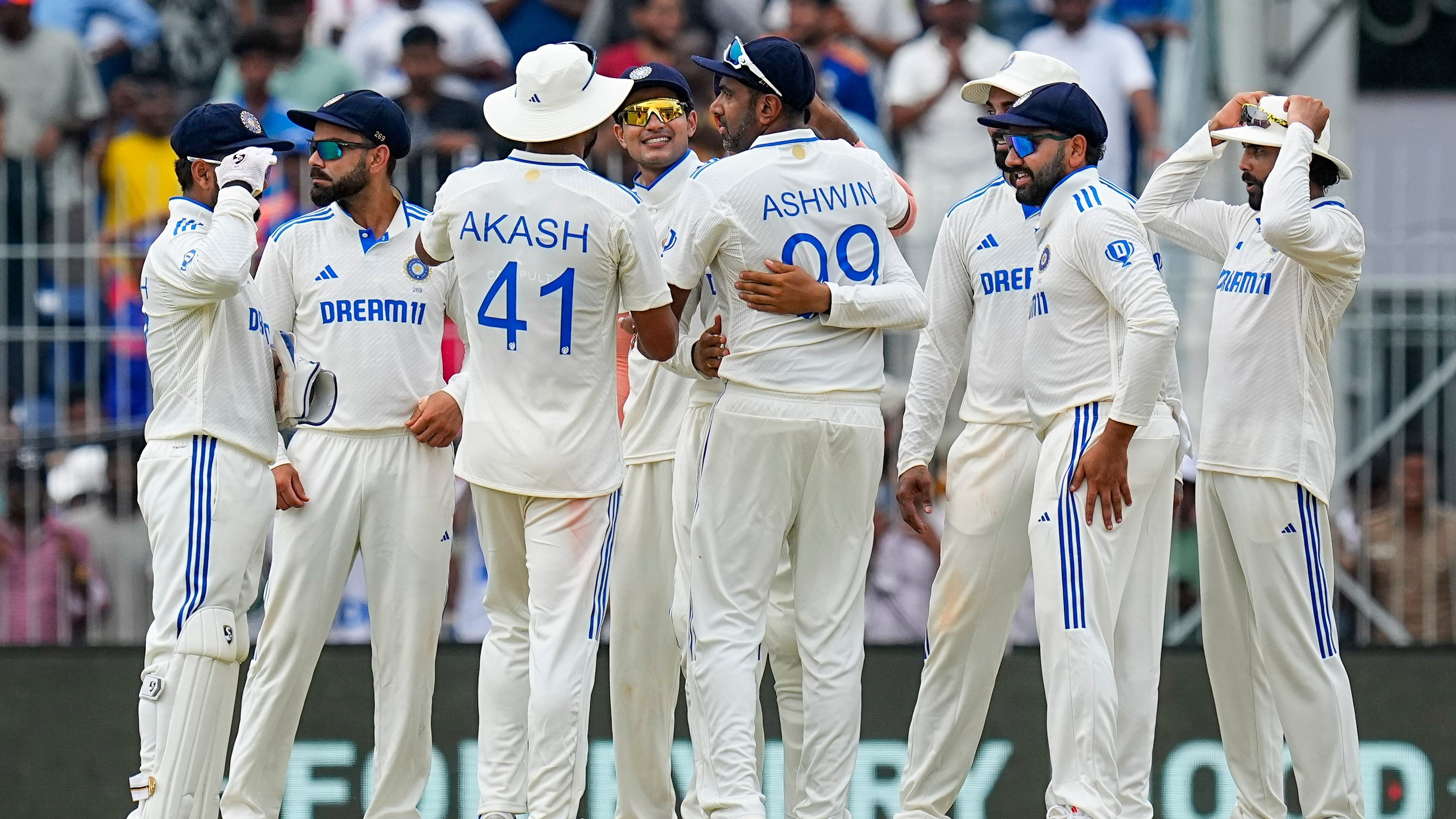 <div class="paragraphs"><p>Indian team players celebrate the wicket of Bangladesh's Zakir Hasan on the third day of the first test cricket</p></div>