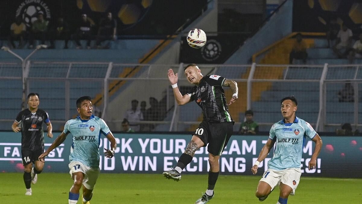 <div class="paragraphs"><p> Mohammedan SC player Alexis Nahuel Gomez (C) heads the ball during the Indian Super League 2024-25 football match between Mohammedan SC and FC Goa, in Kolkata.</p></div>