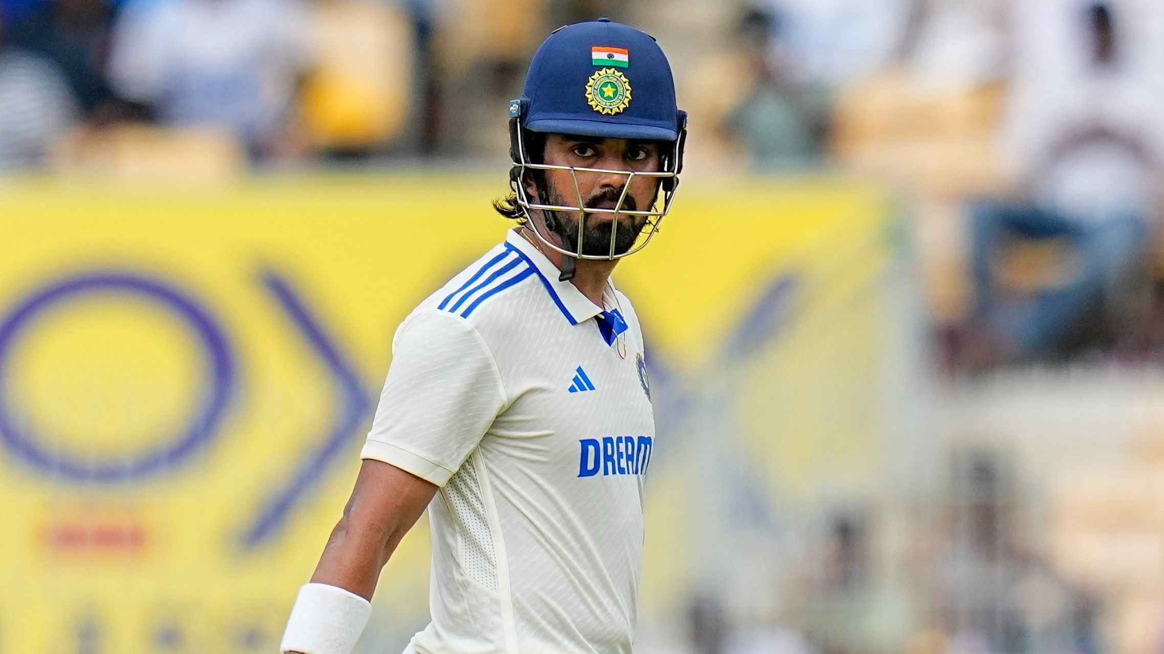 <div class="paragraphs"><p>KL Rahul walks towards the pavilion after being dismissed by Bangladesh's Mehidy Hasan Miraz on the first day.</p></div>