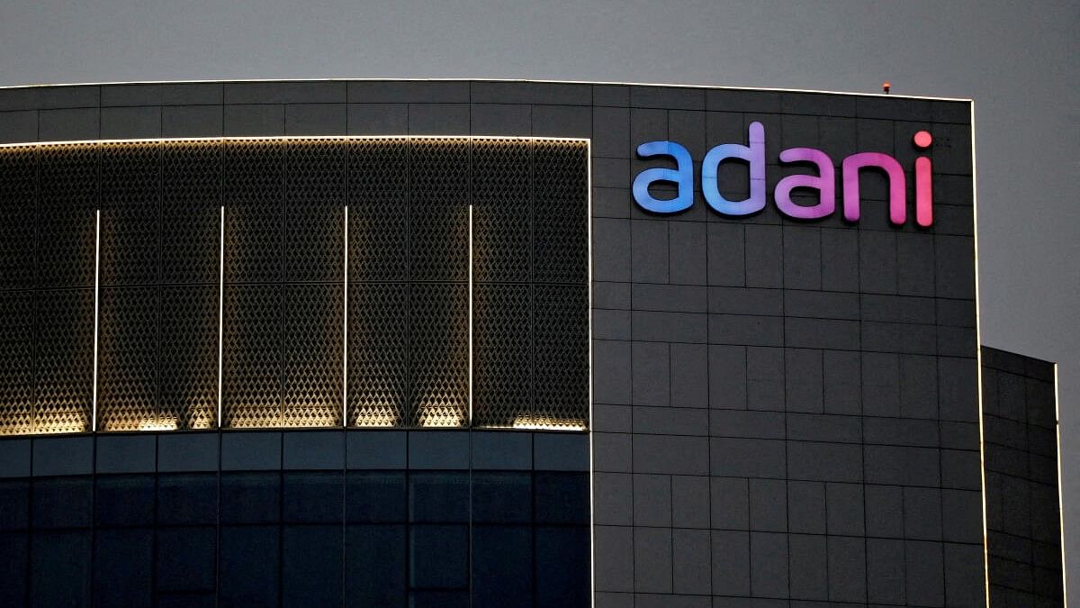 <div class="paragraphs"><p>The logo of the Adani group is seen on the facade of one of its buildings on the outskirts of Ahmedabad.</p></div>