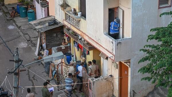 <div class="paragraphs"><p>Police and Forensic team examination at the spot where a lady murdered in a house at Vyalikaval in Bengaluru.</p></div>